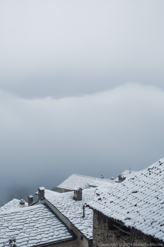 Snow covered rooftops, Sanico. 50mm f9.0.