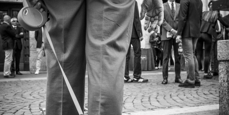 Woman walking dog, Milan, Italy; Street Photography