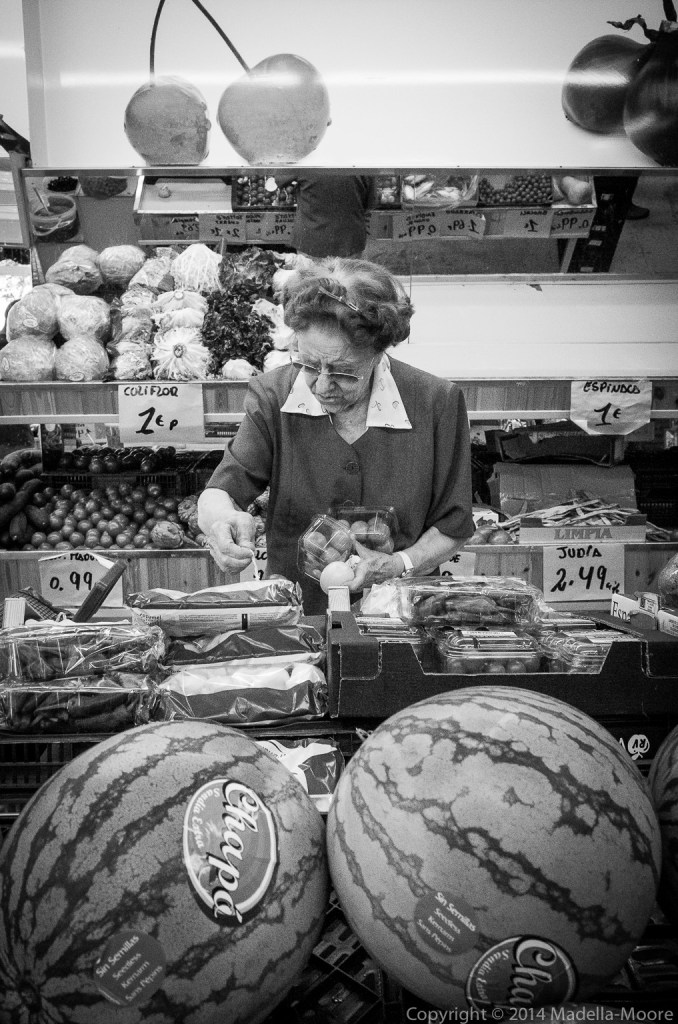 Lady shopping for fruit and vegetables.