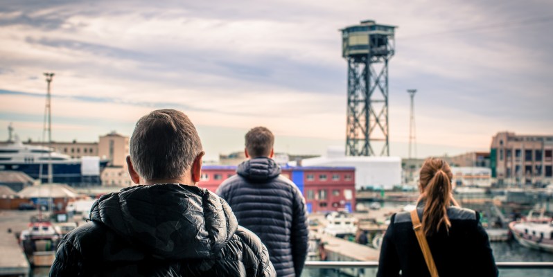 Three People Looking out From Port Vell, Barcelona