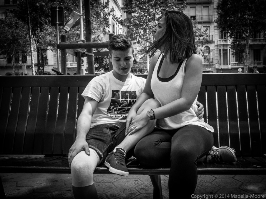Boy with plaster cast and excited woman, Barcelona Street Photography