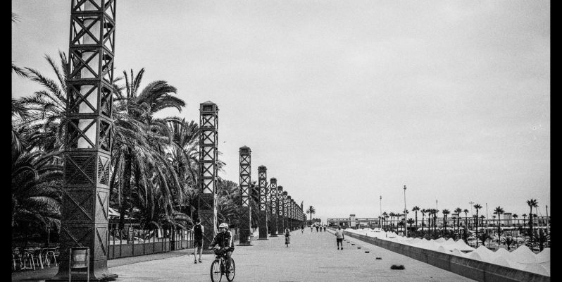 The promenade alongside the marina at Port Olimpic, Barcelona. Leica M7, Zeiss ZM 2/35 Biogon with Ilford HP5+.