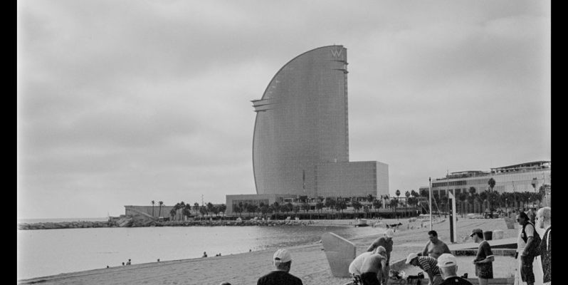 Game playing, Playa de Sant Sebastian, Barceloneta, Barcelona.