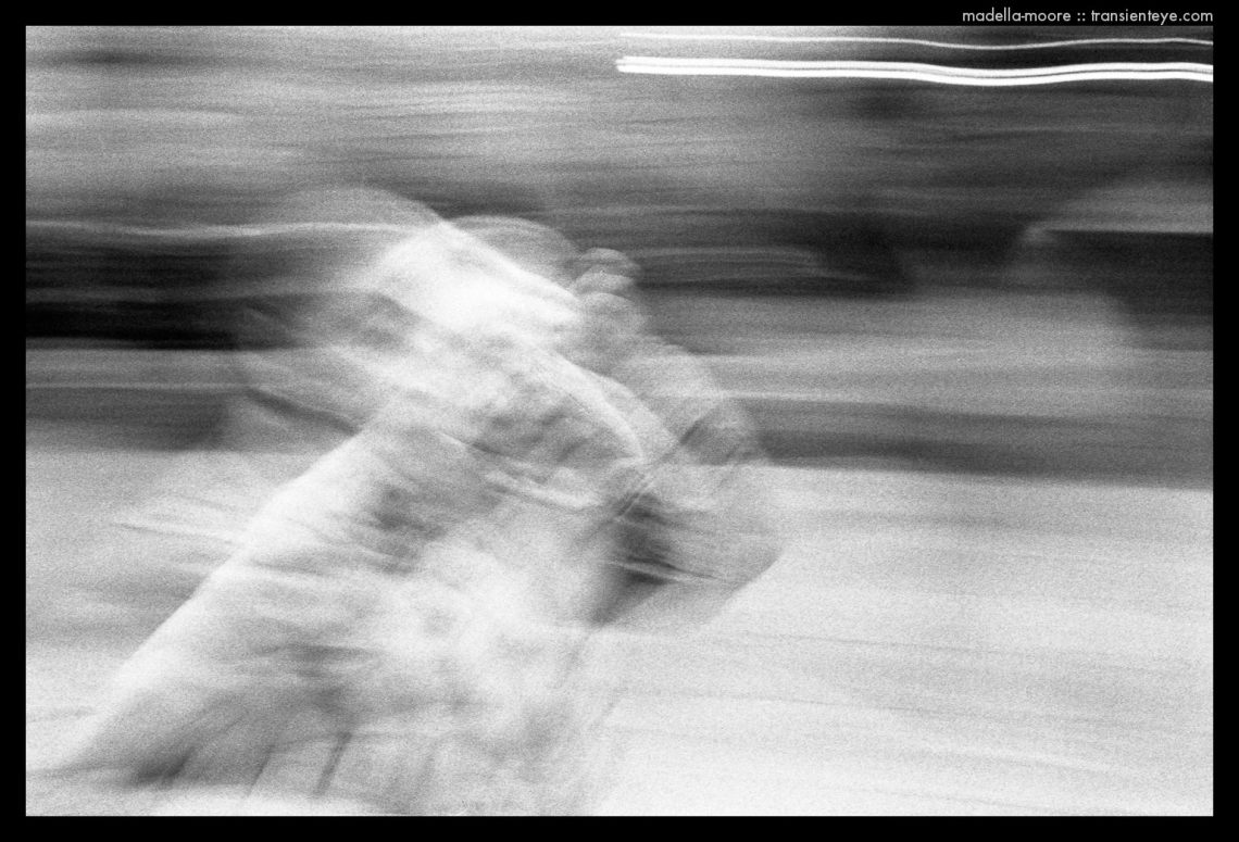 Long exposure, black and white abstract street photograph.
