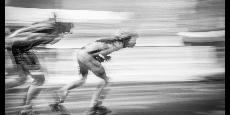 Racing Rollerskaters at the Fiesta Mayor en el Raval, Rambla del Raval, Barcelona – Motion Blurred Film Photography