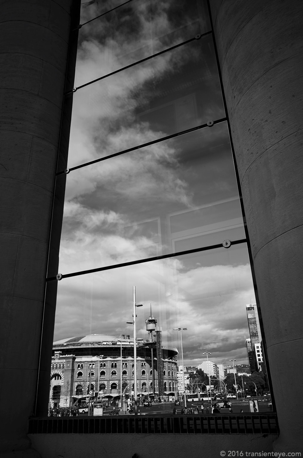Las Arenas, seen in reflection from Fira on the Monjuic. Ricoh GR B&W.