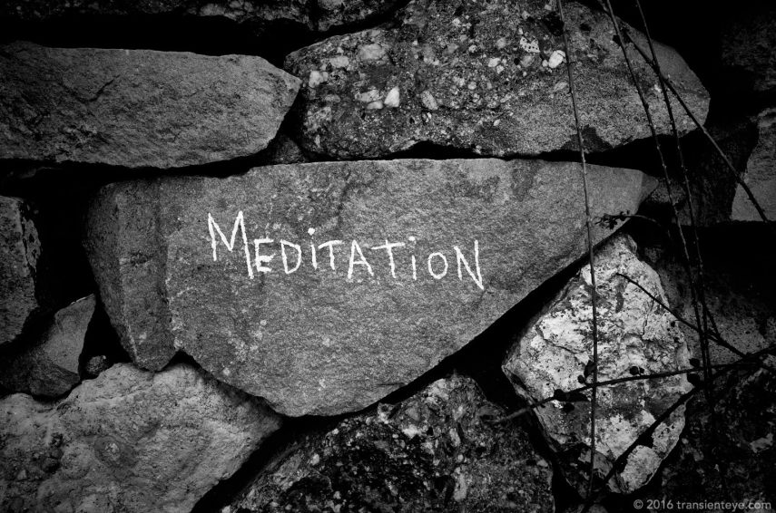 Meditation: Inscription on a stone wall, Barcelona.