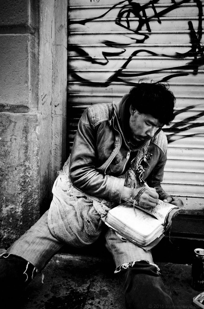 Person sketching in the street, Barcelona.
