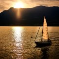 Sunset and yacht on Lago di Como,&nbsp;Italy.